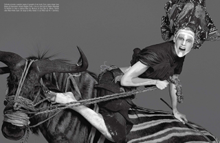 Illustration for article titled Ugh: White Model Dons Tribal-Style Face Paint for Vogue Italia Shoot